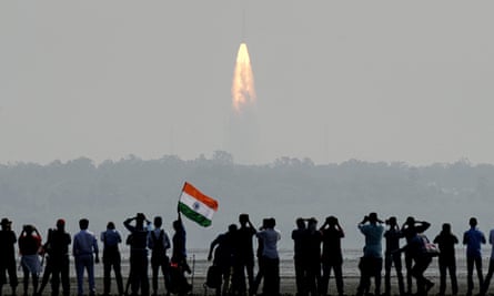 Onlookers watch rocket launch in Sriharikota, India