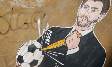 A poster by the street artist Laika MCMLIV depicts Andrea Agnelli, the chair of Italian soccer club Juventus, on a wall of a building in Rome.