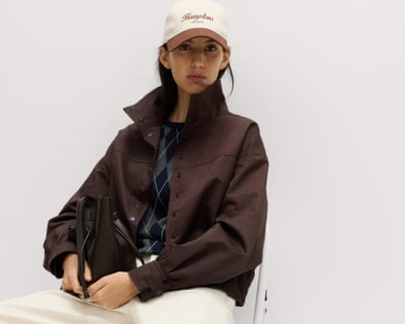 A model wears the M&S funnel-neck bomber jacket.