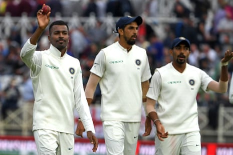 Hardik Pandya walks off with the ball after taking five wickets.