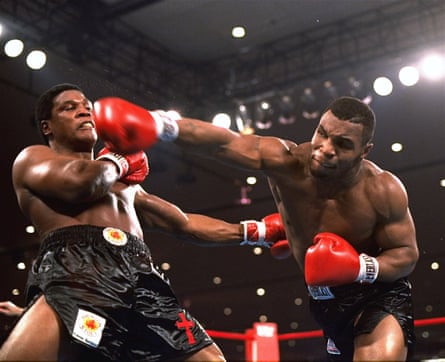Mike Tyson punches Trevor Berbick