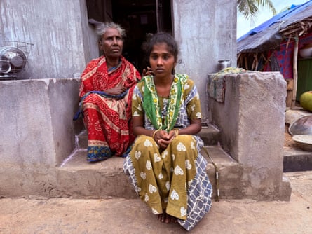 Rekha Naduputri sitting outside a house