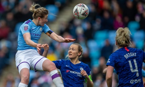 Ellen White of Manchester City Women outjumps the Chelsea defence. City are the leaders of the WSL.