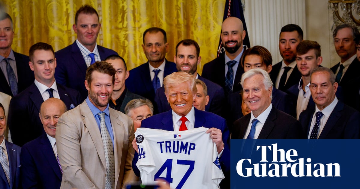 Dodgers fans outside the stadium holding boycott signs, because when your team’s owners are tied to detention profiteers and your president calls your city a trash heap, maybe you sit this World Series photo op out.