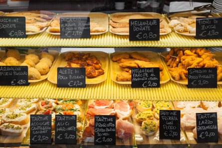 Baked goods behind the glass countert at Buffet Clai, Trieste, Italy
