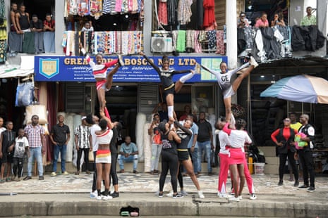 The Lagos Cheer Nigeria cheerleading team practising on the streets