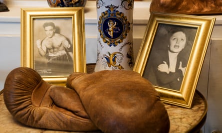 Boxings gloves and portraits of Edith Piaf and Marcel Cerdan on display at Musée Edith Piaf, Paris, France