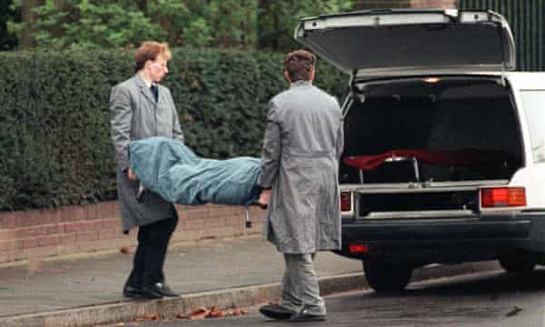 Rohwedder’s body is removed from his home in Düsseldorf.