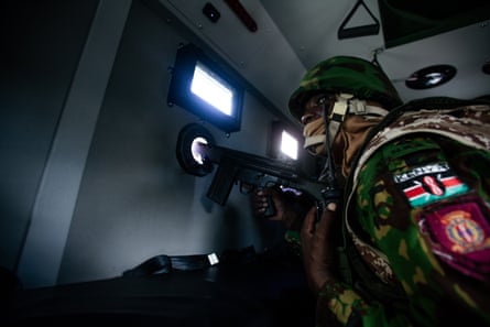 An officer in Port-au-Prince on 30 November 2024.