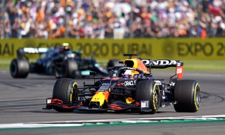 Max Verstappen waves to the crowd after winning the sprint race at the British Grand Prix at Silverstone in July 2021.