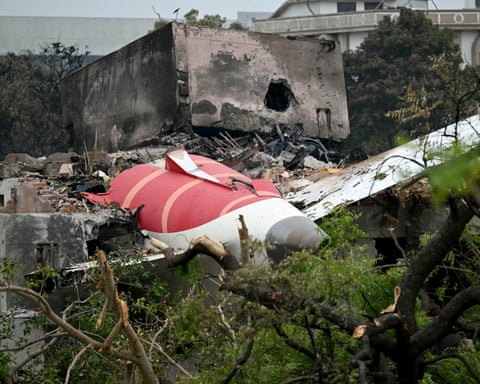 Debris of Air India flight 171 after it crashed in a residential area near the airport in Ahmedabad