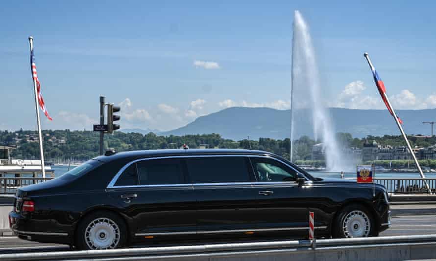A limousine carrying Putin passes Lake Geneva ahead of the US-Russia summit with Biden.