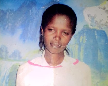 Agnes Wanjiru in a pink blouse