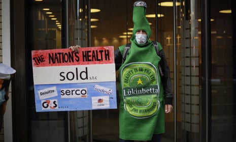 A protest outside the Department of Health and Social Care office in London over Serco’s handling of the coronavirus test, track and trace system.