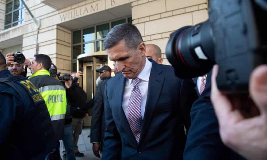 Michael Flynn, the former national security adviser, leaves after the delay in his sentencing hearing at US District Court in Washington DC on Tuesday.