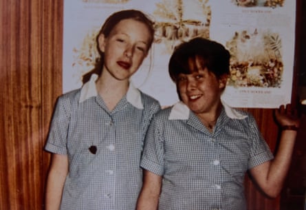 Catherine and Annabel at school aged about 10, wearing school uniform.