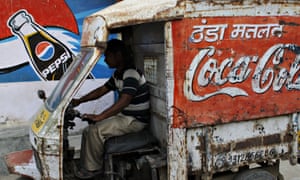 A drinks delivery driver in the suburbs of New Delhi.