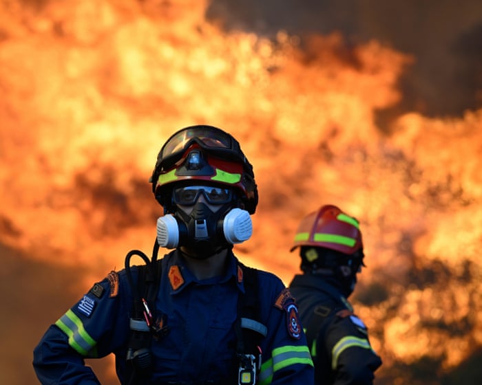 Two helicopters collide outside Athens as Greece battles to control wildfires — image supplied by The Guardian World's feed