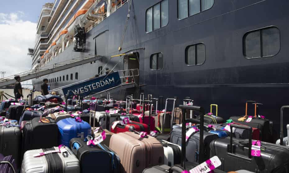 Luggage is ready as some passengers disembark the MS Westerdam cruise ship docked in Sihanoukville, Cambodia on February 14, 2020. 