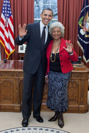 U.S. President Barack Obama gives the Vulcan salute with Nichelle Nichols in the Oval Office of the White House on 29 February 2012