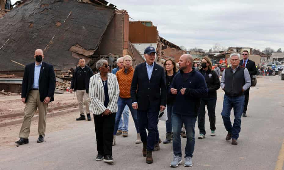 Joe Biden tours a neighborhood in Mayfield, Kentucky Wednesday.