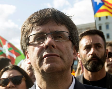 Carles Puigdemont has defied a Spanish court summons to stay in Brussels.