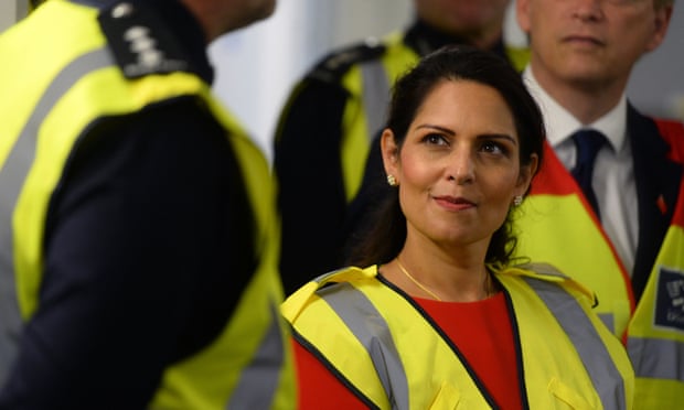 The home secretary, Priti Patel, with border officials at the Port of Dover.