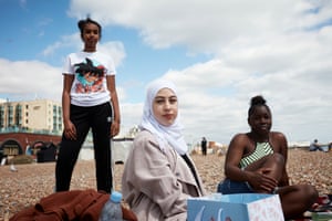 (From left) Ebada Hassan, Zeinab Lamah and Danielle Tcheugoue, on a day trip to Brighton from London