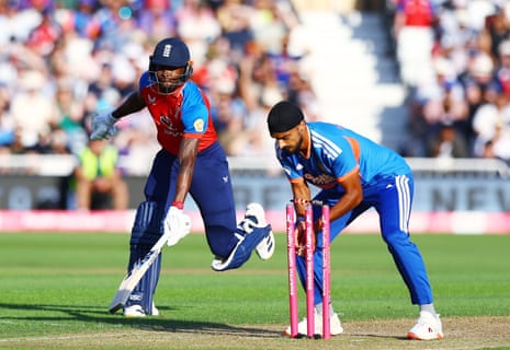 Jofra Archer of England is run out.