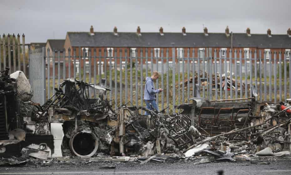 A burnt-out bus on the Shankill Road in west Belfast.