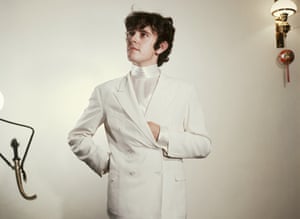 Donovan in a white suit