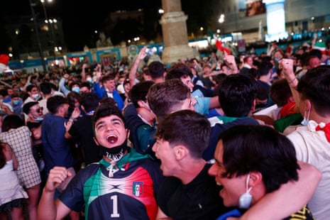 Italy fans celebrate after Turkey’s Merih Demiral scored an own goal and and Italy’s first goal.