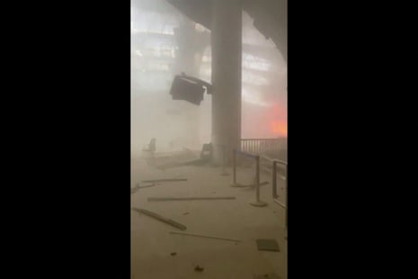 Damage and smoke filling a terminal at the airport.