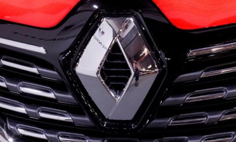 Close-up of the Renault diamond badge on the radiator grille of a vehicle