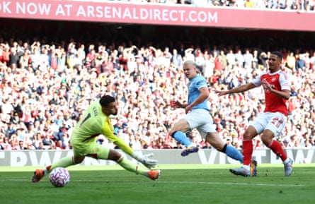 Erling Haaland scores Manchester City’s first goal against Arsenal.