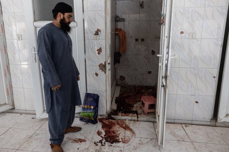 Gobind Singh, 25, stands in Kabul’s Sikh Gurdwara, where Islamic State launched an attack against the minority community. Two people were killed but the assailants just missed the worshippers – up to 70 of them were due to arrive minutes later.