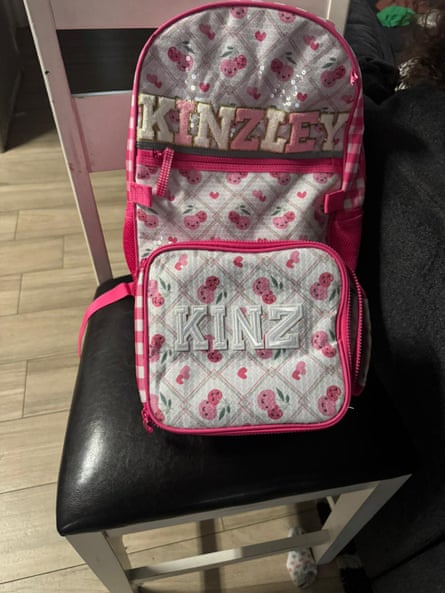 pink backpack and lunch pail