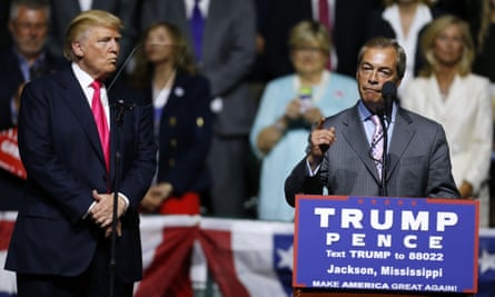 Donald Trump listens to Nigel Farage during a Trump rally on 24 August.