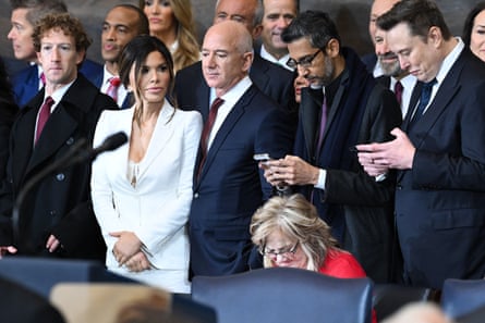 (L-R) CEO of Meta and Facebook Mark Zuckerberg, Lauren Sanchez, Amazon founder Jeff Bezos, Google CEO Sundar Pichai and Tesla and SpaceX CEO Elon Musk attend the inauguration ceremony before Donald Trump is sworn in as the 47th US President in the US Capitol Rotunda in Washington, DC, on January 20 2025