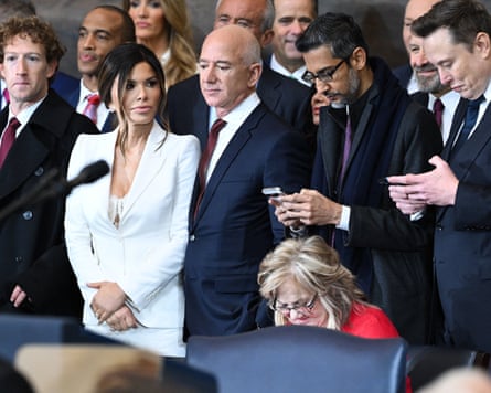 Men and a woman in crowd