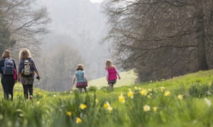 Visitors exploring the garden in springtime at Cliveden, Buckinghamshire