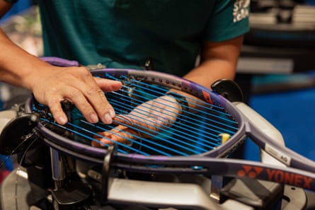Australian Open tennis stringers at work
