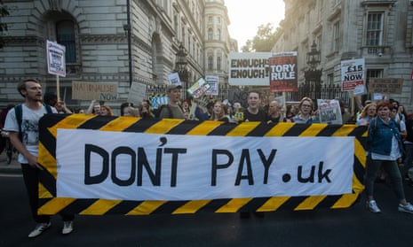 People take part in a ‘Don’t Pay UK’ protest outside Downing Street, London, on Monday.