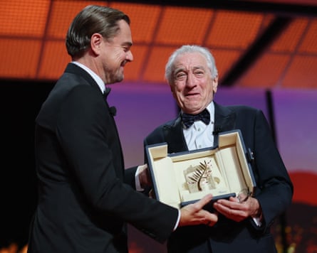 Leonardo DiCaprio presenting De Niro with his honorary Palme d’Or.