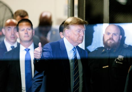 Donald Trump returns to the courtroom after a short recess during the second day of his trial in criminal court in New York, New York, 16 April 2024.