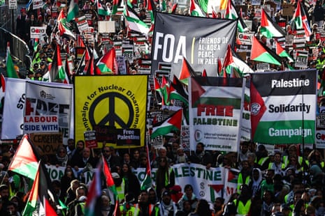 Protesters holding placards and Palestinian flags take part in a ‘National March For Palestine’ in central London on November 25, 2023, calling for a ceasefire in the conflict between Israel and Hamas.