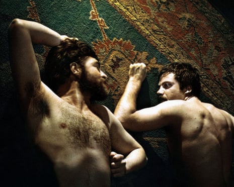 Alan Bates and Oliver Reed in Women in Love, 1969. For this fireside wrestling scene, Williams filtered all the lamps on set to be the same colour then created a flickering effect, shooting with a hand-held camera to allow more freedom to follow the action.