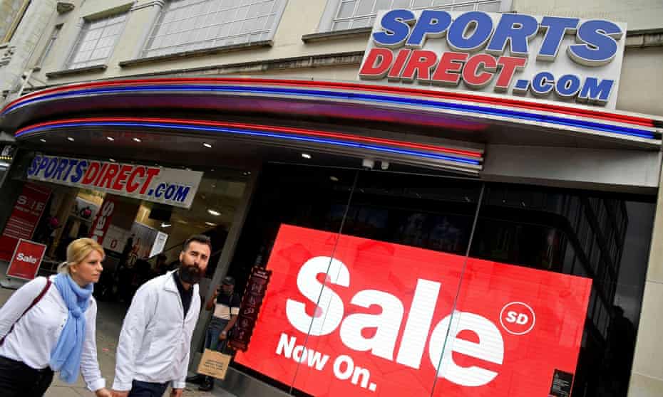 Shoppers walk past a branch of Sports Direct in Oxford Street, London.