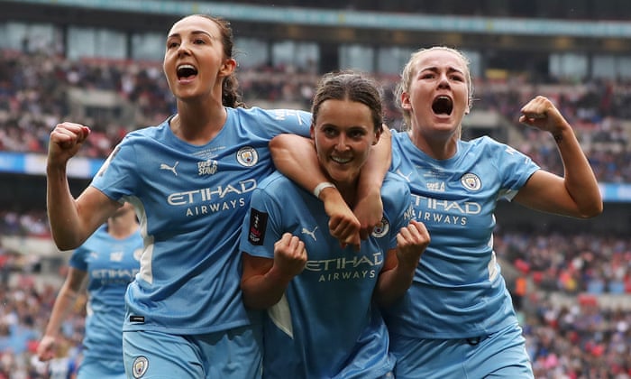 Hayley Raso of Manchester City Women celebrates with team-mates Caroline Weir and Lauren Hemp after equalising just before the end of the match.
