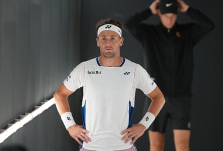 Casper Ruud prepares to go on court
